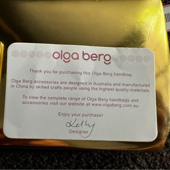 NWT - Olga berg gold clutch bag. NWT. Comes with chain strap. Rectangular clasp. - Picture 12 of 15